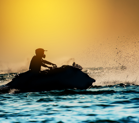 silhouette-man-drive-freestyle-jet-ski-sunset-professional-rider-tricks-sea 1